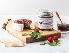 terrapin ridge preserve served on cheese board adding sweet-spicy contrast
