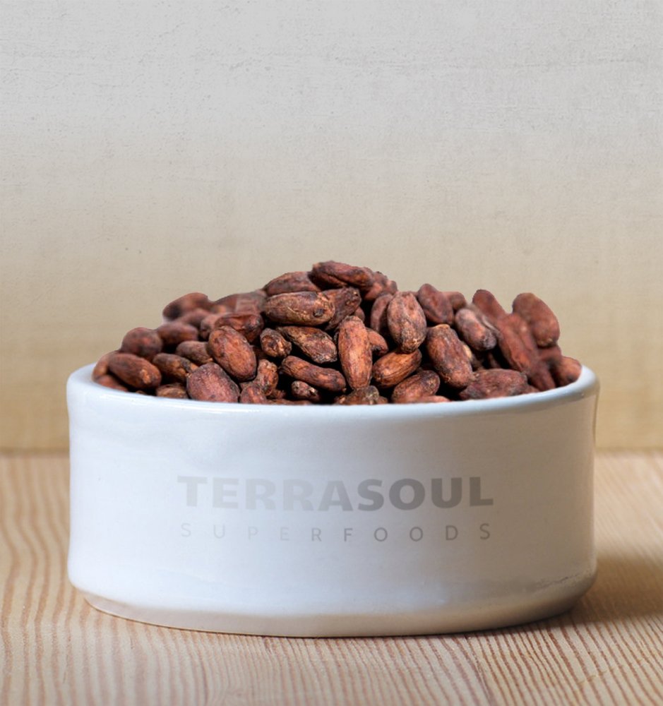 Terrasoul Superfoods cacao beans in a bowl used in recipes demonstrating versatile culinary use