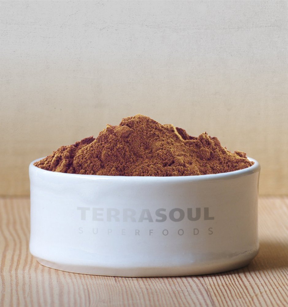Terrasoul cacao being scooped into bowl to show easy portioning and convenience