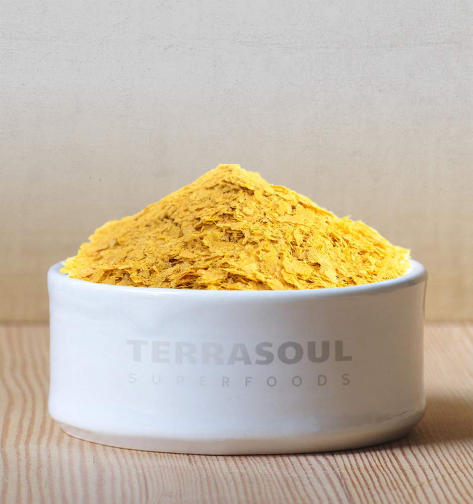 Terrasoul Superfoods scoop on spoon displaying portion size and easy serving