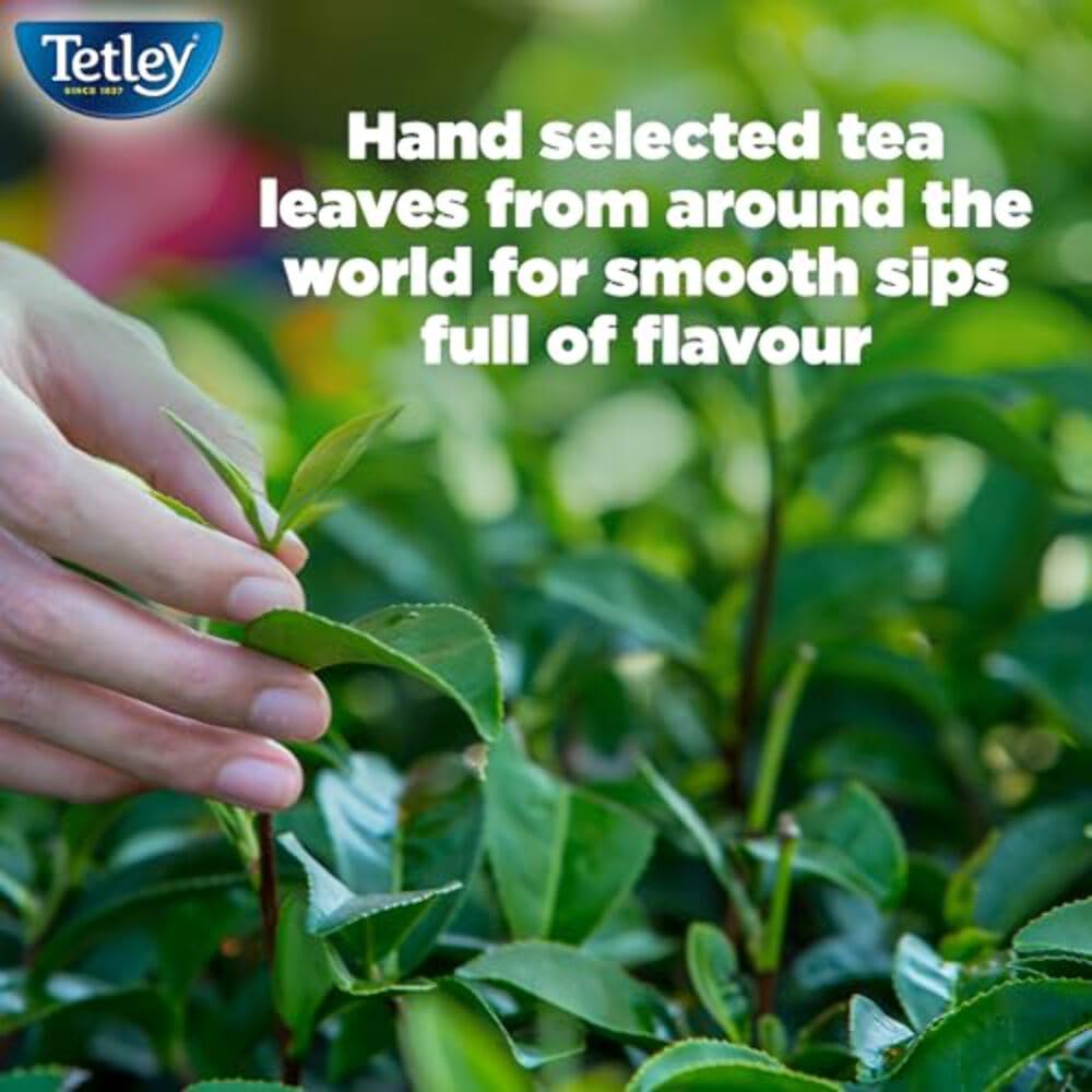 Tetley decaf tea bag steeping in cup demonstrating rich aroma release