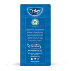 Tetley teabag steeping in cup illustrating quick brewing and rich color development
