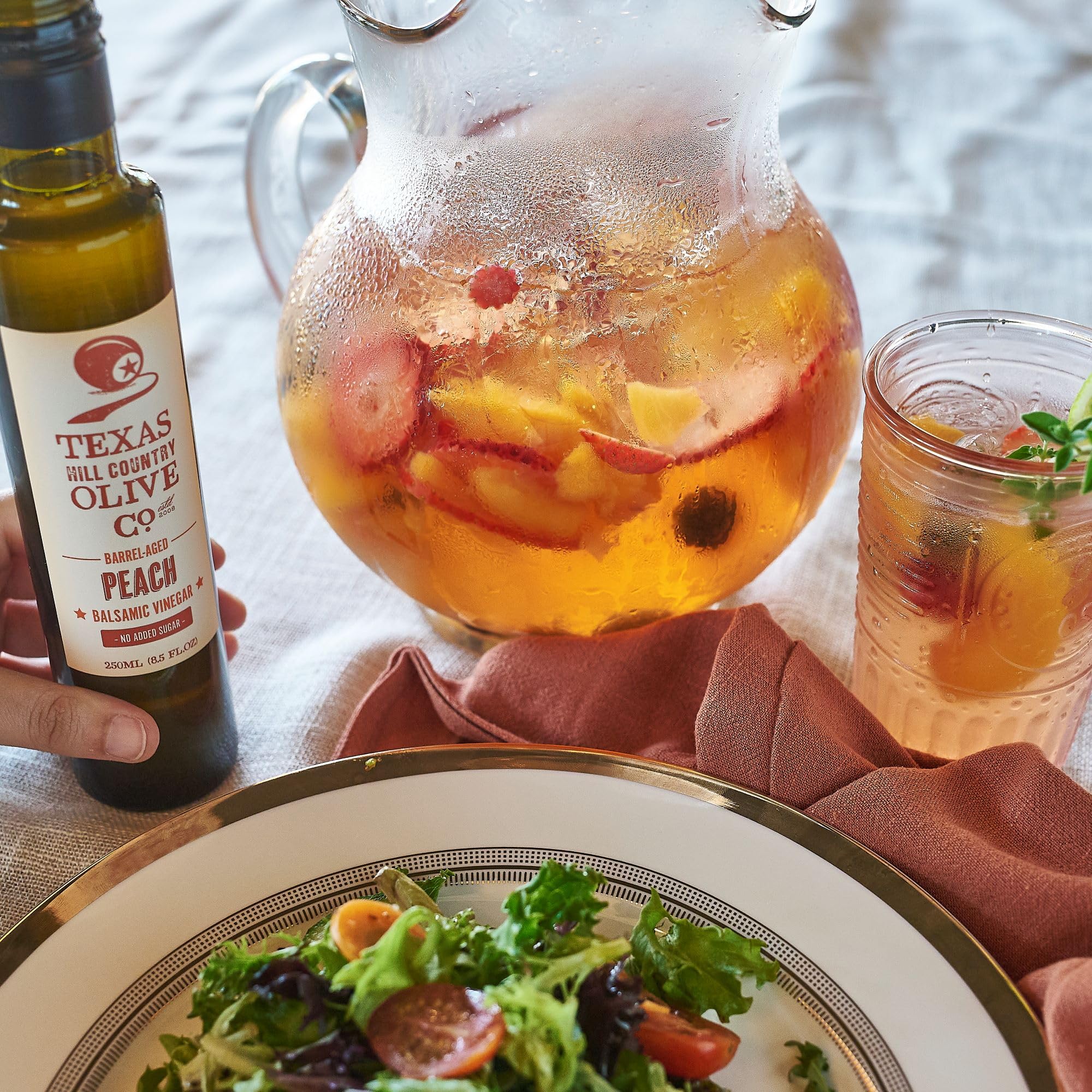TEXAS HILL COUNTRY OLIVE CO. glazed pork topped with peach balsamic for flavor