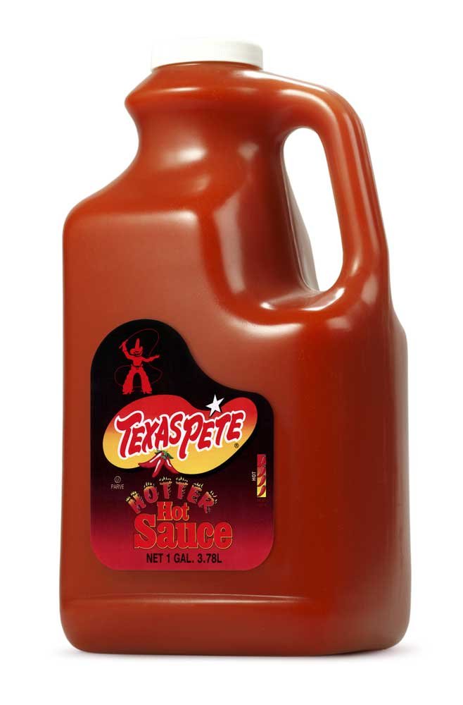 Texas Pete Hotter front bottle showing one-gallon container and bold label benefit: bulk heat
