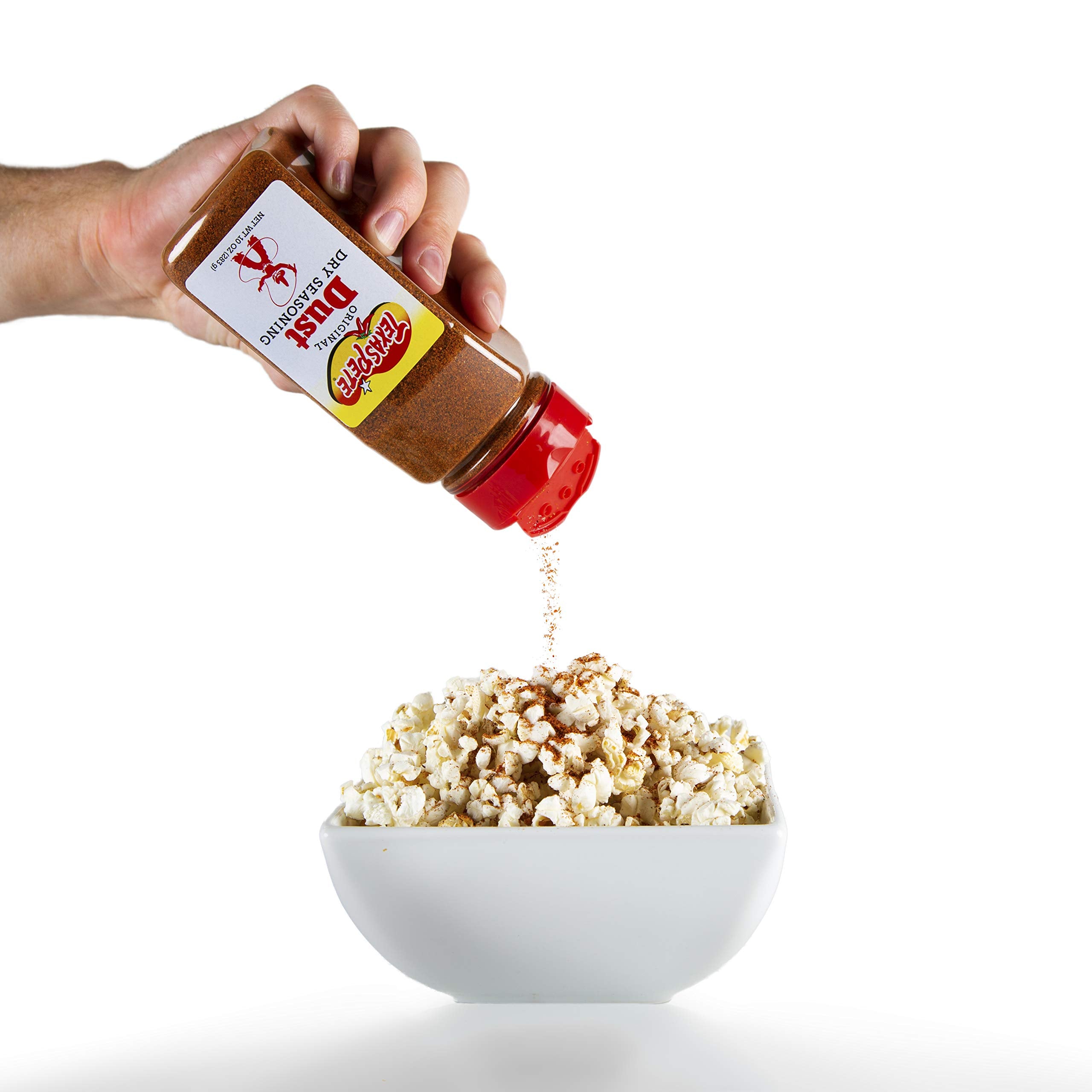 Texas Pete Original Dust being sprinkled on roasted potatoes, enhances flavor