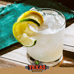 Texas Roadhouse mix being poured into a glass demonstrating easy cocktail preparation
