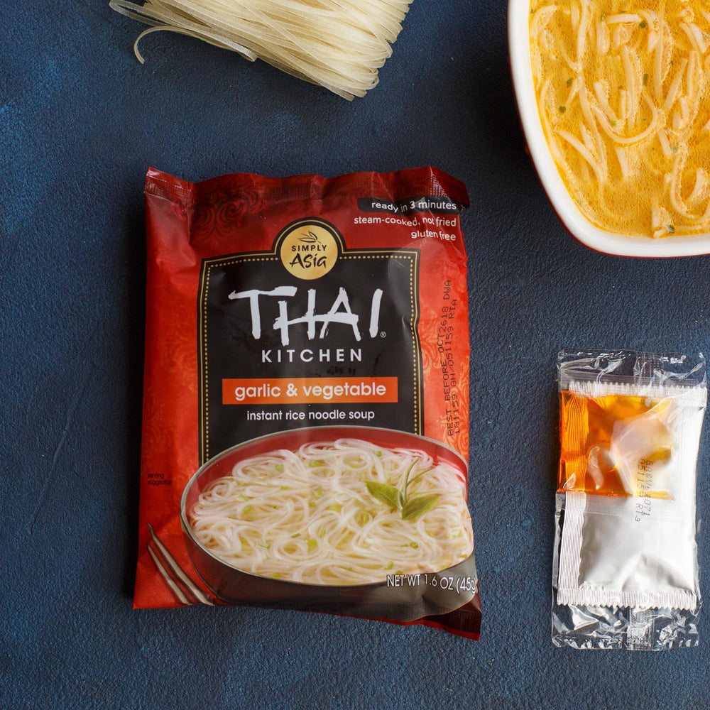 Bowl of Garlic & Vegetable Thai Kitchen soup with vegetables, savory comfort shown