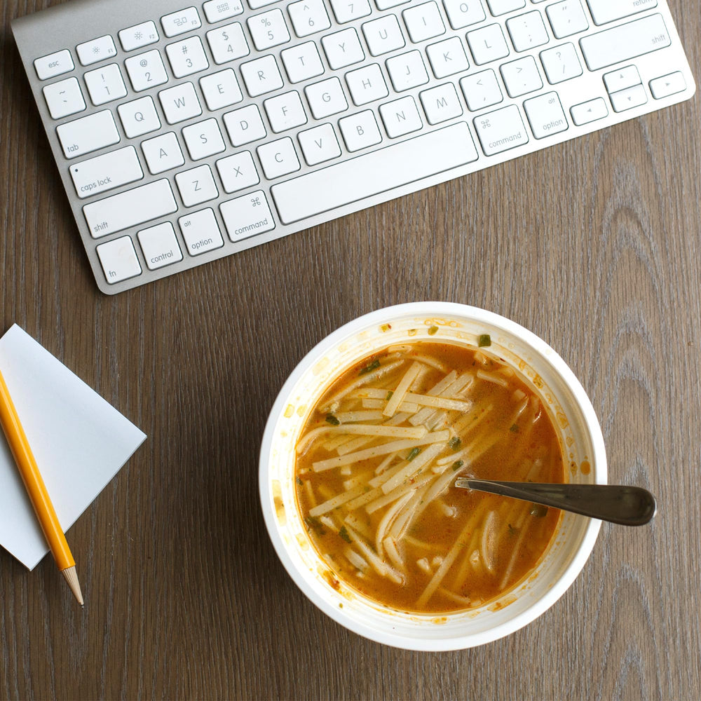 Close-up of Thai Kitchen steamed rice noodles texture, light chew benefit highlighted