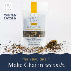 The Chai Box brewed cup steaming on a saucer showcasing warm, comforting aroma
