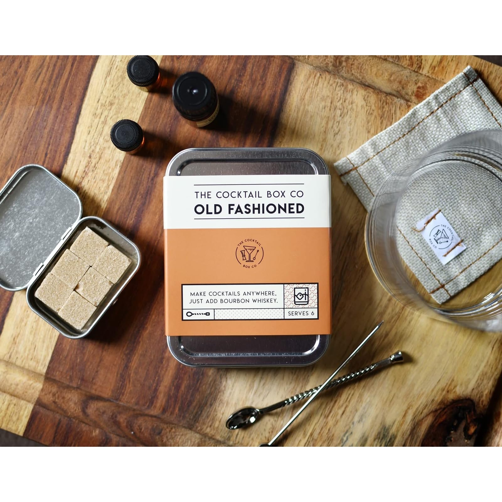 The Cocktail Box Co. stirrer and instruction card showing simple mixing guidance