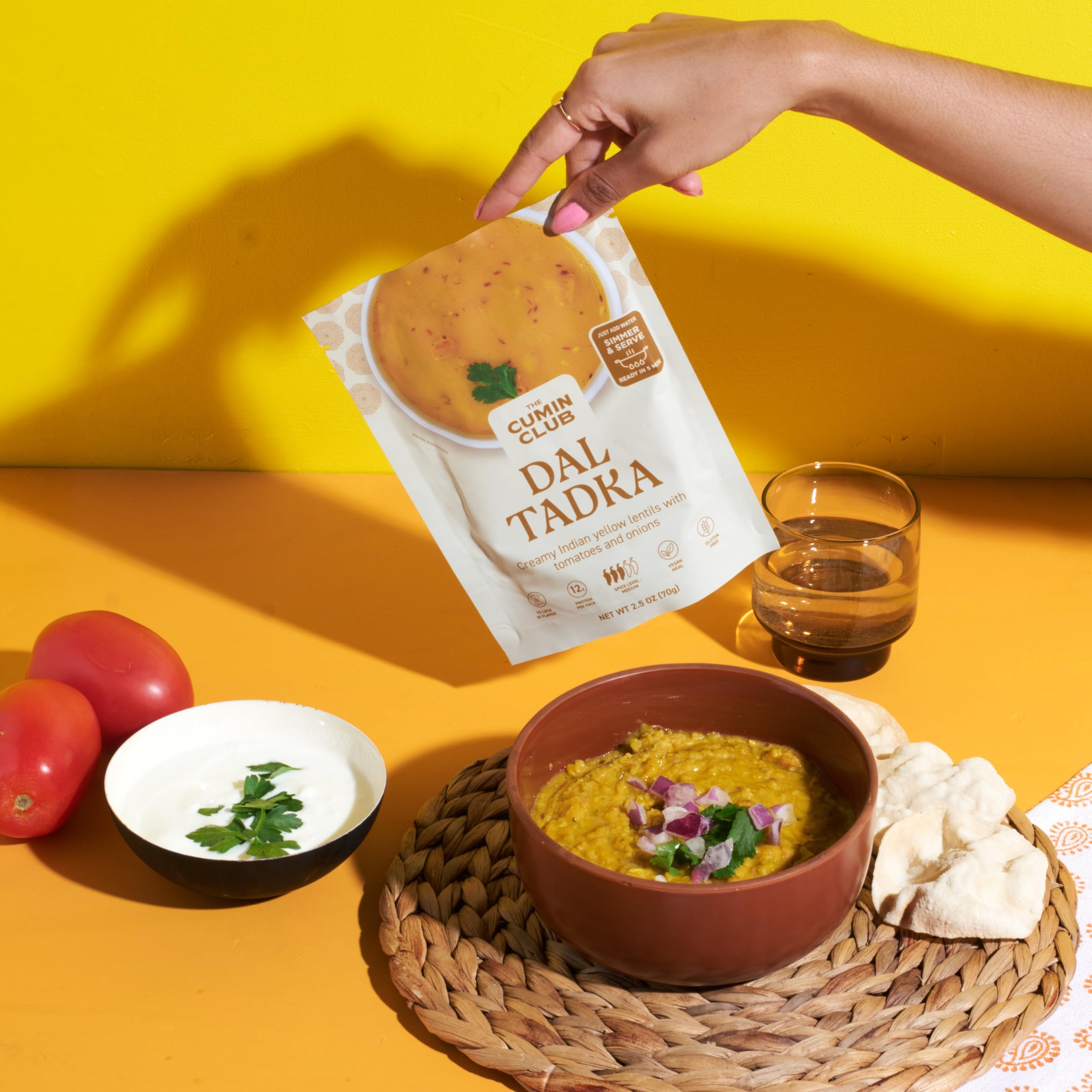 the cumin club spices and vegetables spread to show natural ingredient sourcing