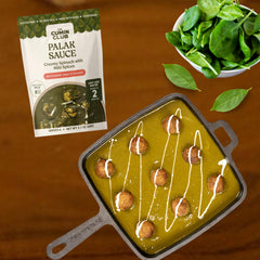 the cumin club korma close-up showing creamy texture and fresh spices