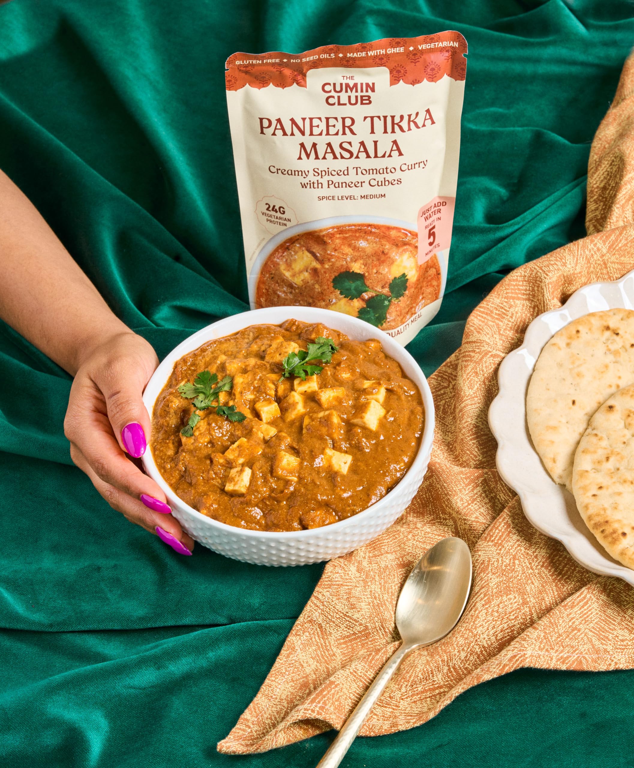 the cumin club tender paneer cubes close-up showing soft rehydrated texture
