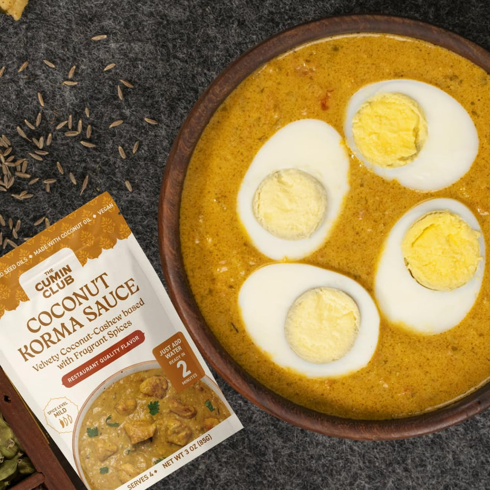 the cumin club simmer sauce in pan with chicken demonstrating quick meal prep