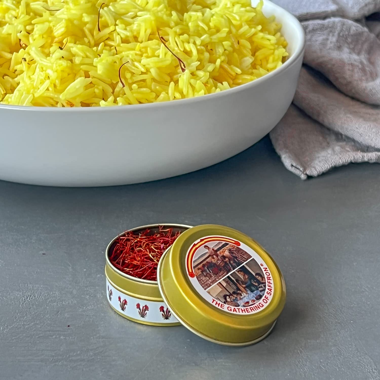 The Gathering of Saffron next to a measuring spoon, demonstrates compact 2g portioning