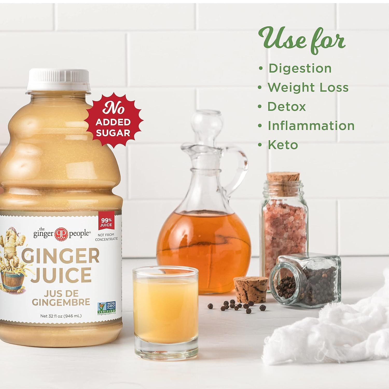 The Ginger People pouring a ginger shot into a glass, convenient ready-to-drink preparation