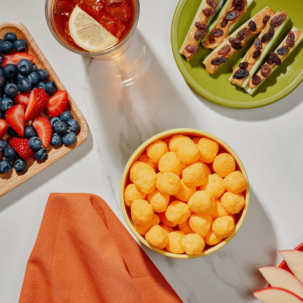The Good Crisp Company cheese balls in a serving bowl ready for parties and quick sharing