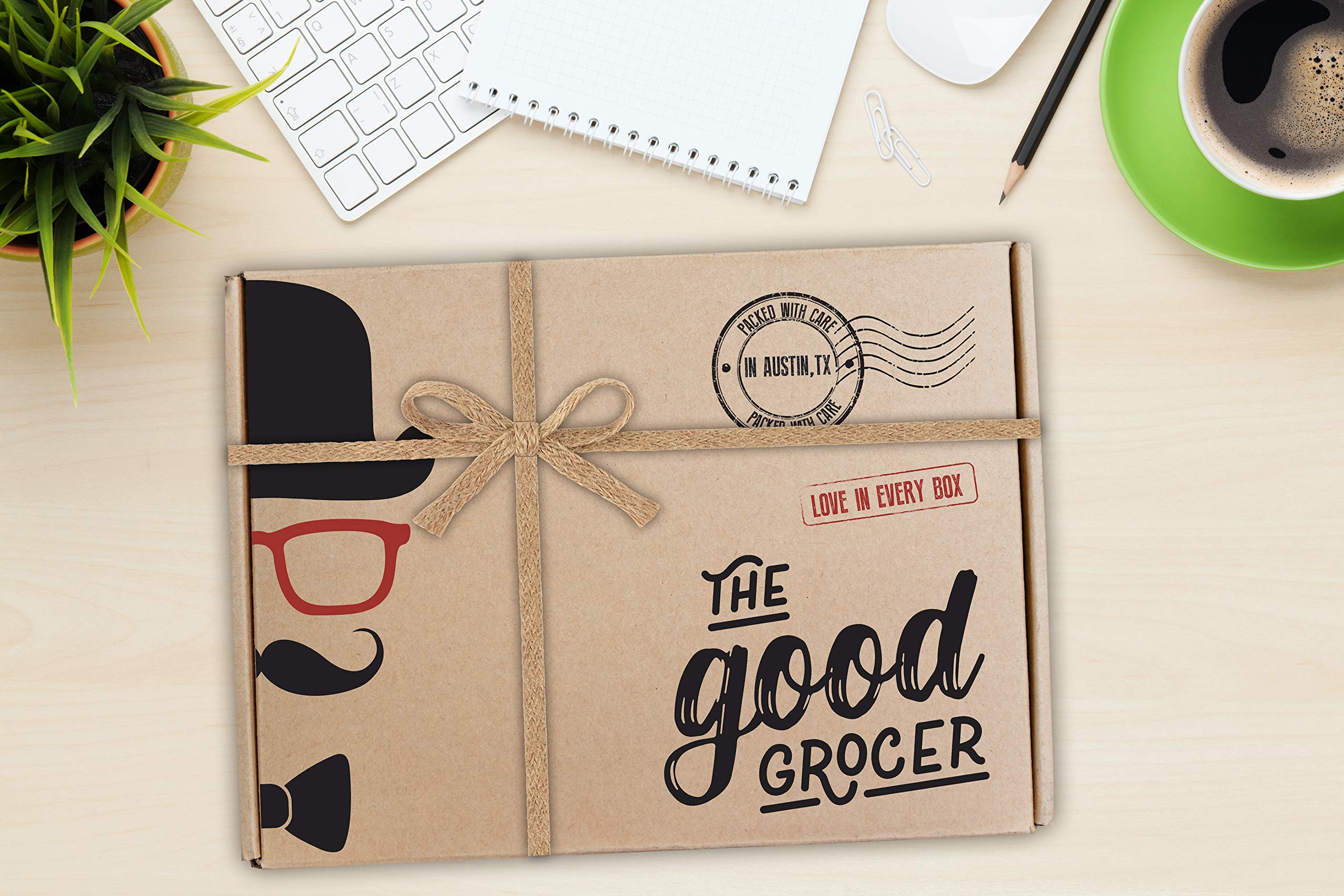 The Good Grocer open box overhead view revealing assorted gluten free vegan snacks
