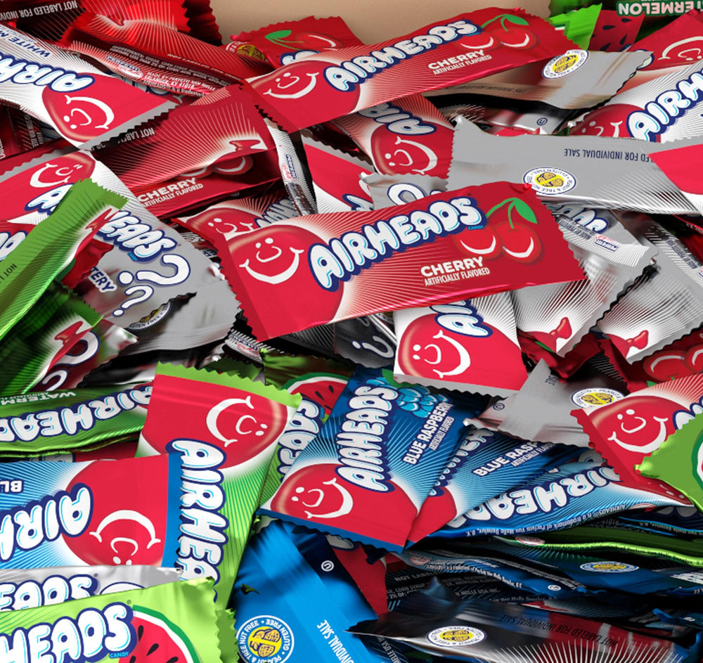 THE HAMPTON CANDY COMPANY spread of individually wrapped mini bars showing variety for portioning