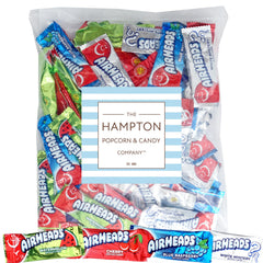 THE HAMPTON CANDY COMPANY close-up of an unwrapped Airheads mini bar displaying chewy texture and color