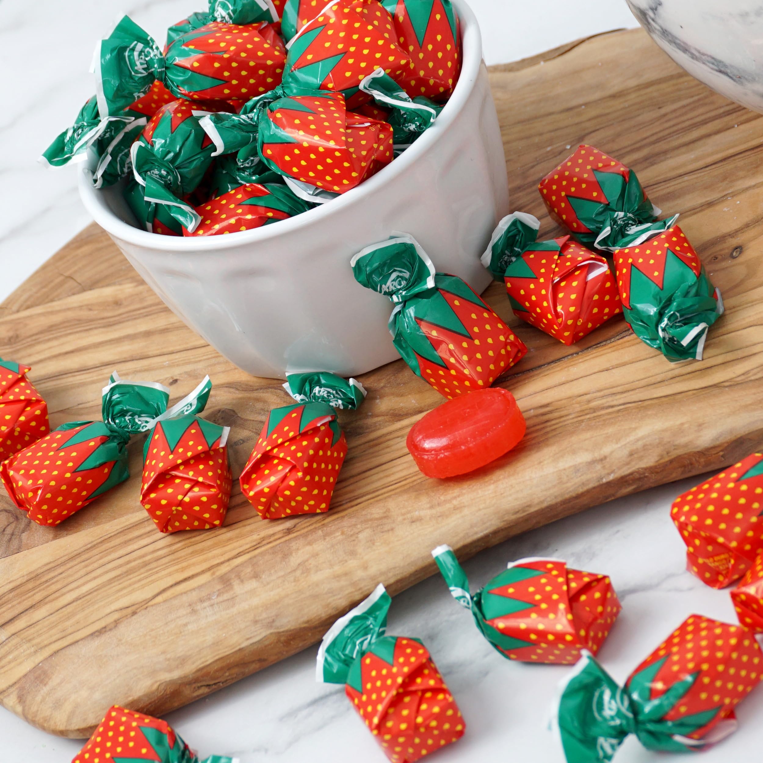 The Hampton Candy Company Arcor strawberry next to coin for size comparison and portioning