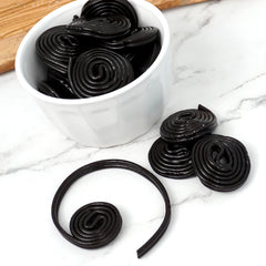 THE HAMPTON CANDY COMPANY licorice wheels in a clear jar for easy serving at events