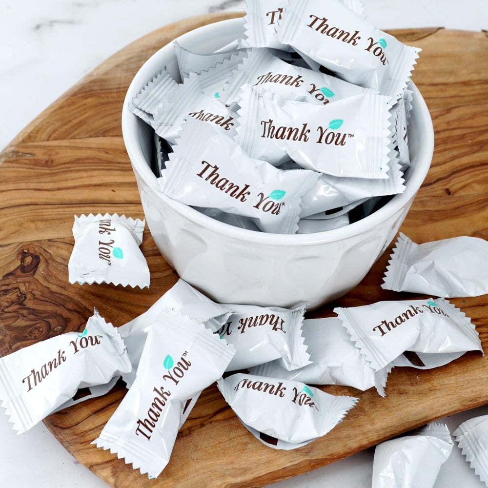 THE HAMPTON CANDY COMPANY mints on a table for events displaying elegant hospitality