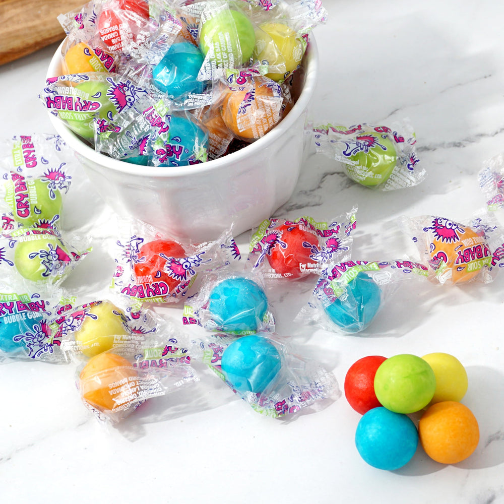 THE HAMPTON CANDY COMPANY gumballs in hand showing size and piece count