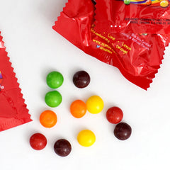 THE HAMPTON CANDY COMPANY open bag spilling fun-size packs for easy portioning