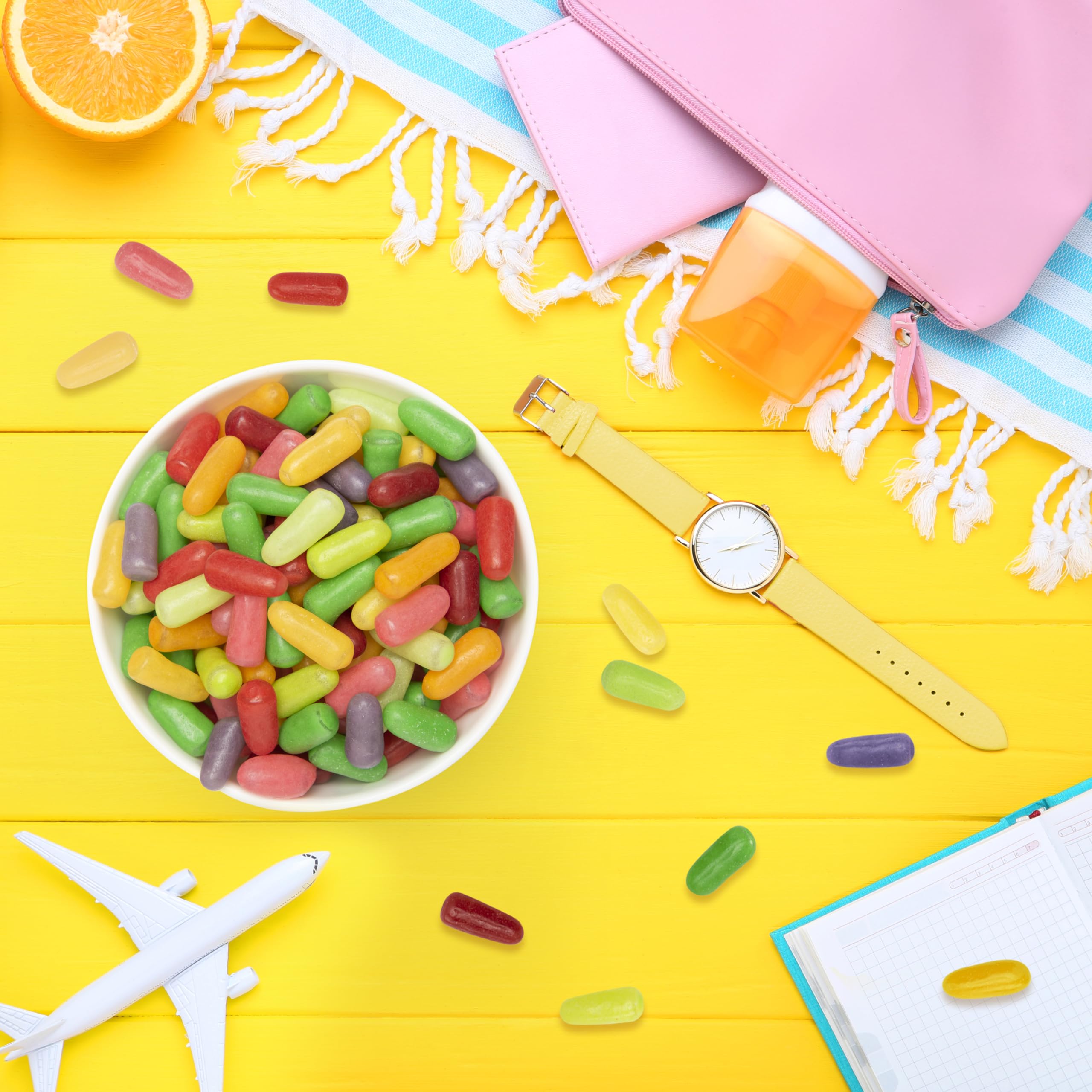 THE HAMPTON CANDY COMPANY bag next to a measuring cup for scale, demonstrates large 28.8 oz capacity