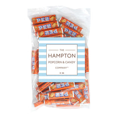 THE HAMPTON CANDY COMPANY close-up of individually wrapped orange candies, shows texture and wrap benefit
