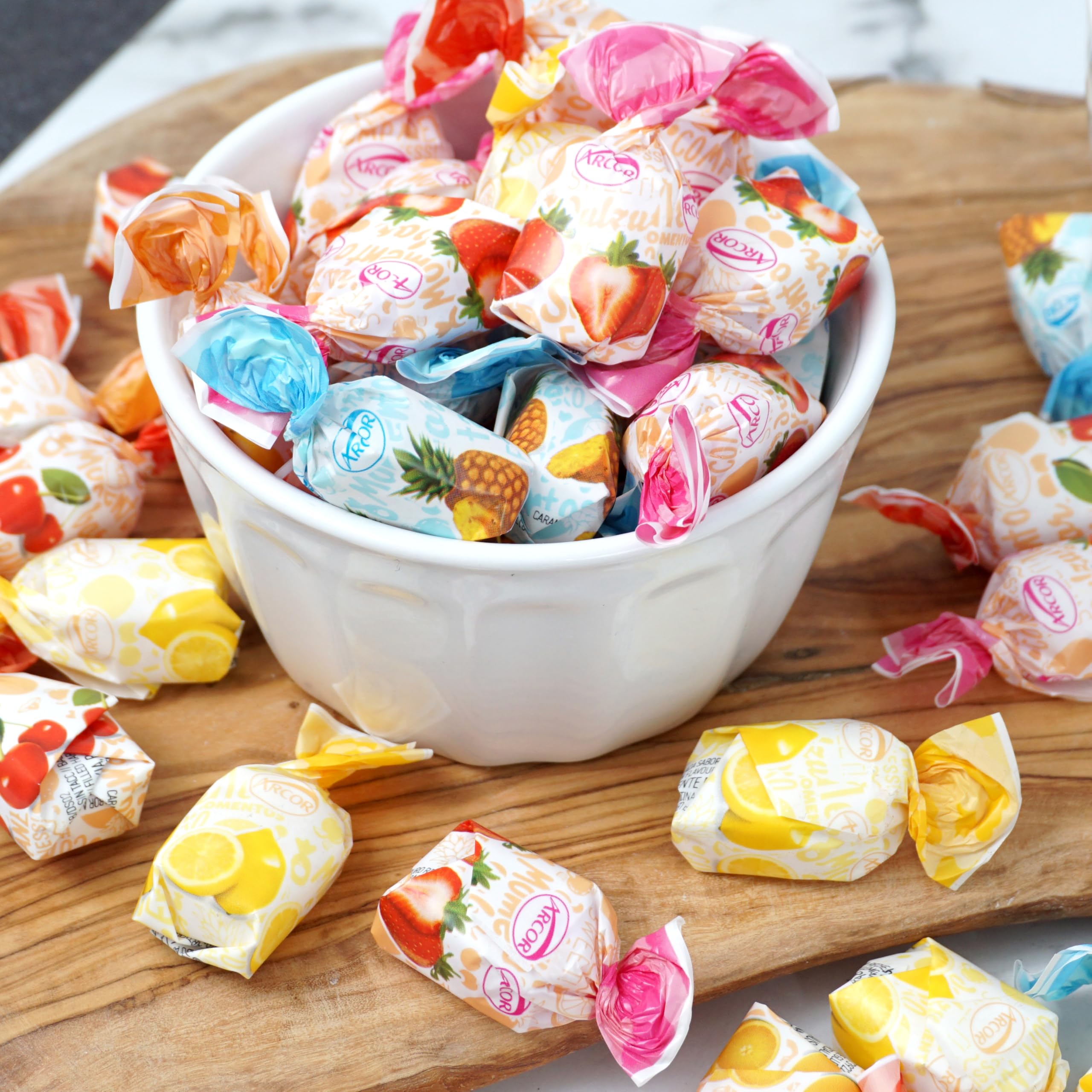 THE HAMPTON CANDY COMPANY size comparison beside a hand to show portion per piece