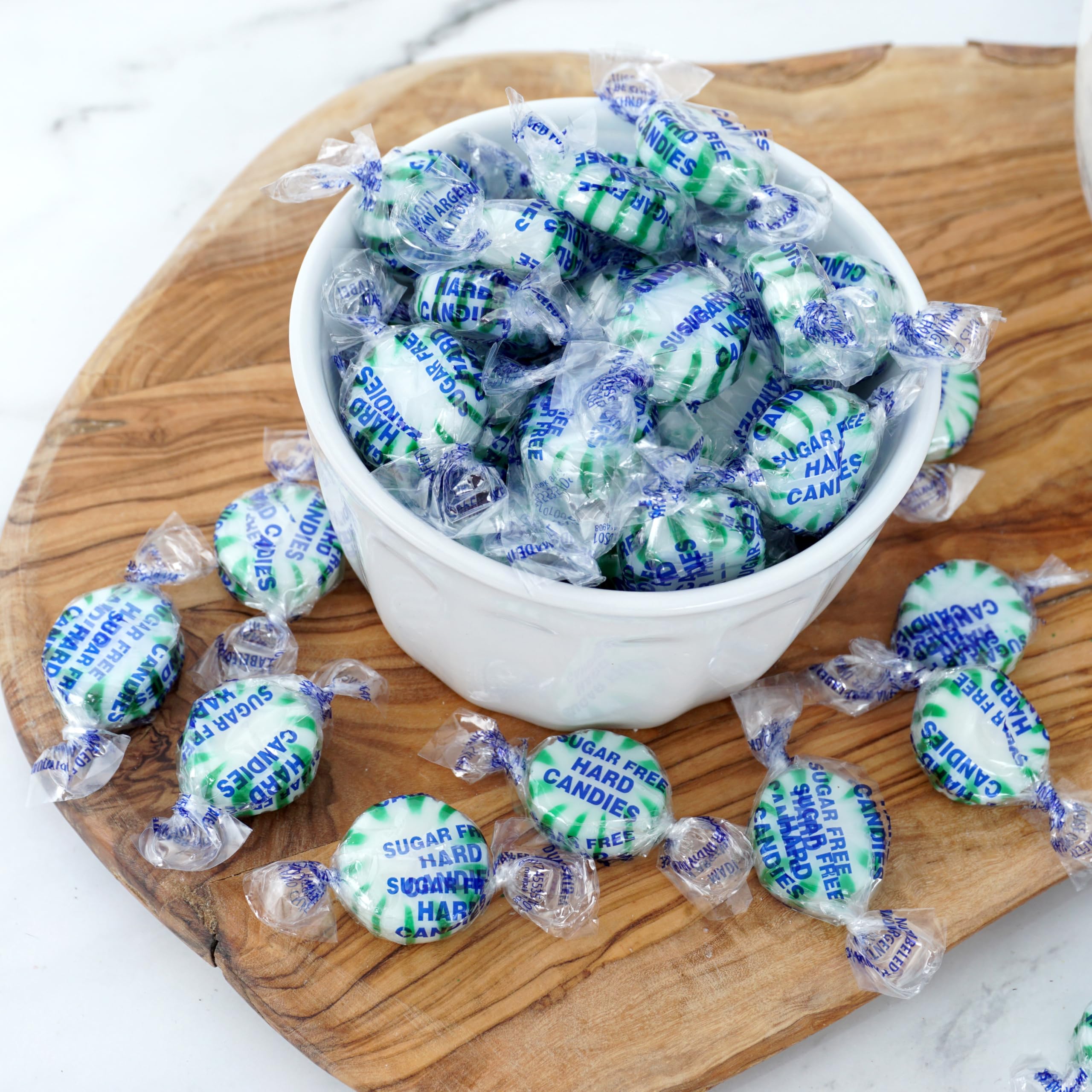 THE HAMPTON CANDY COMPANY mint held in hand to show scale and convenient portioning