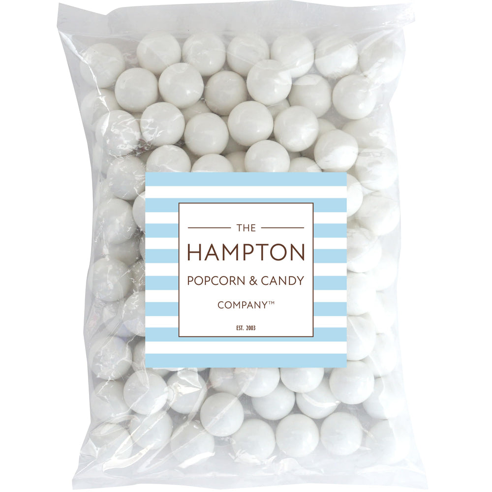 THE HAMPTON CANDY COMPANY close-up of gumball shell texture, highlights smooth shine and consistent coating