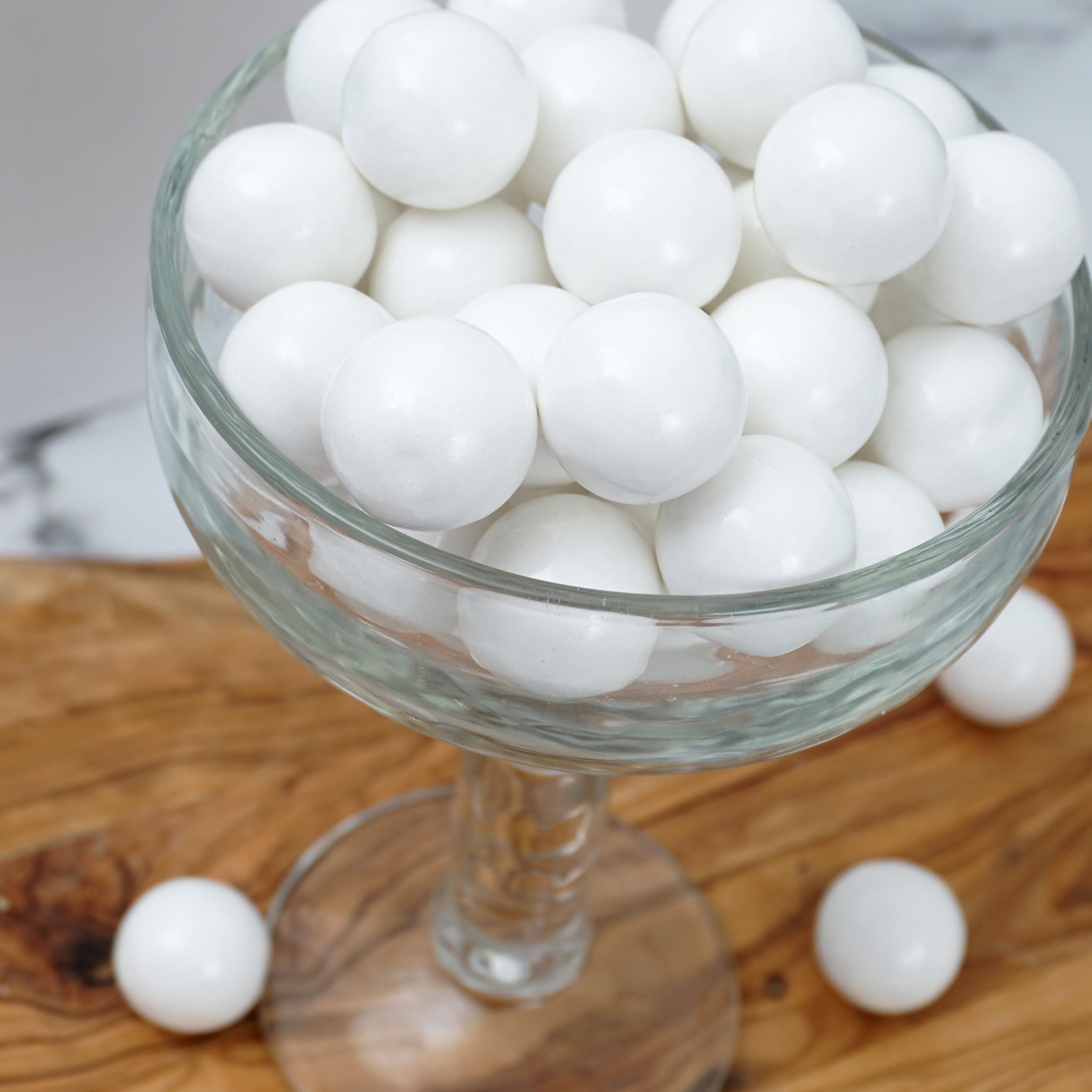 THE HAMPTON CANDY COMPANY gumballs inside a dispenser, demonstrates easy refill and attractive display