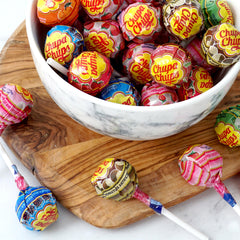 THE HAMPTON CANDY COMPANY bag beside ruler for scale showing approx 64 lollipops