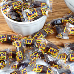 THE HAMPTON CANDY COMPANY bag beside a ruler showing size and piece count advantage