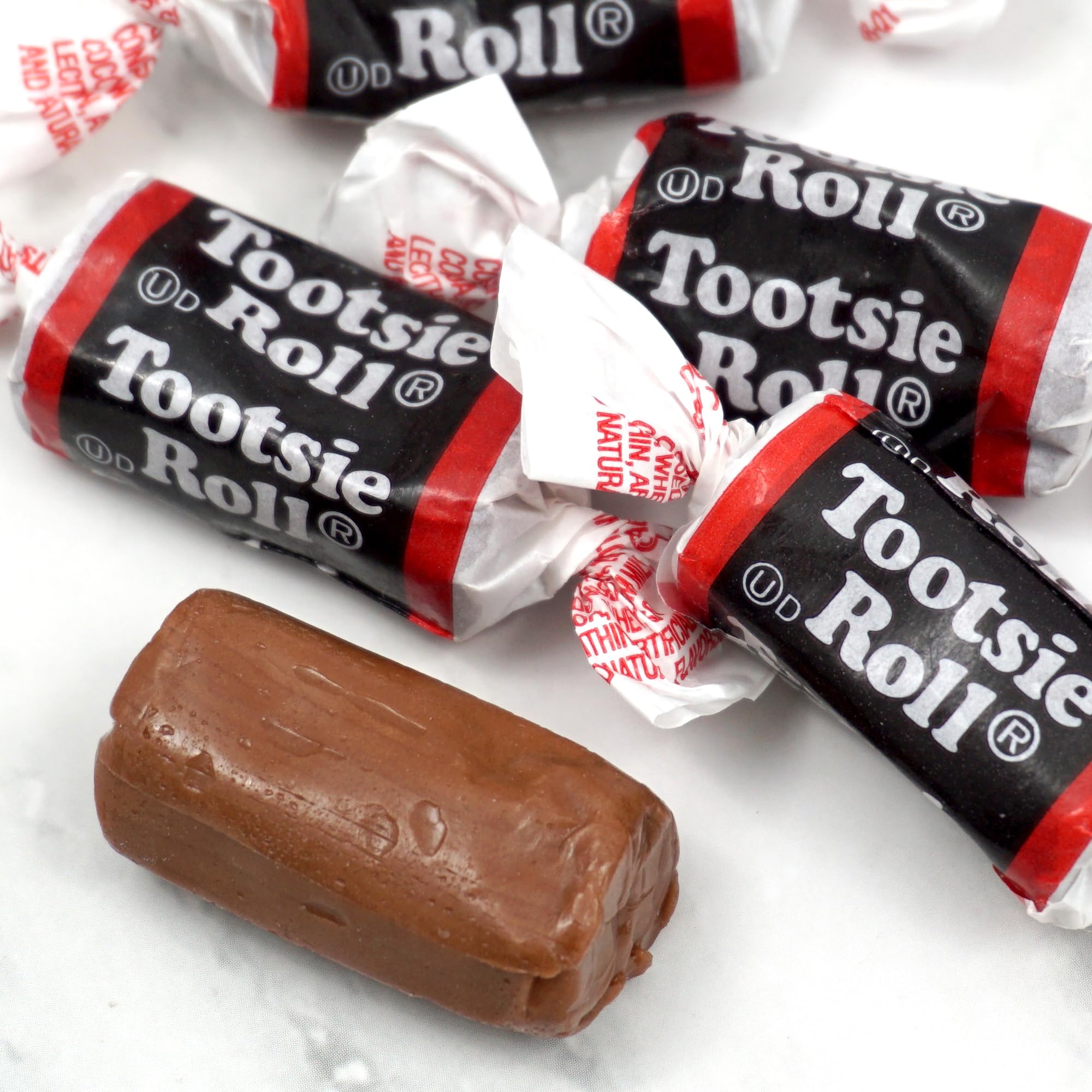 Bowl of individually wrapped Tootsie Roll Midgees by The Hampton Popcorn for easy sharing at events