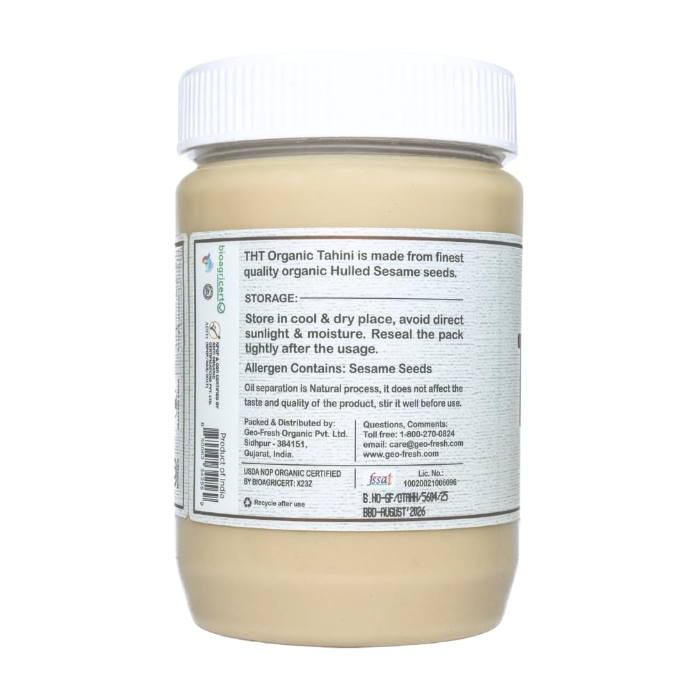 The Holly Tree tahini jar beside a ruler to show 16 oz size and portion clarity