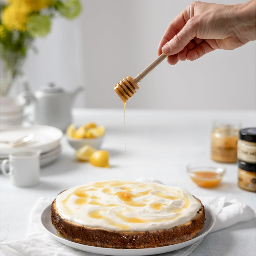 THE HONEY OF SWEDEN jar next to a knife for scale to show true 250g size