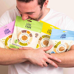 The Low Carb Co crackers being dipped showing versatile serving options