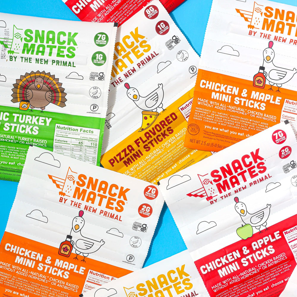 The New Primal family picnic with snack mates illustrating grab-and-go use