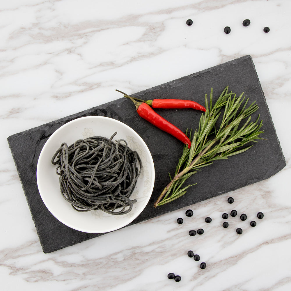 The Only Bean spaghetti in bowl with pesto showing versatile recipes benefit: tasty swaps