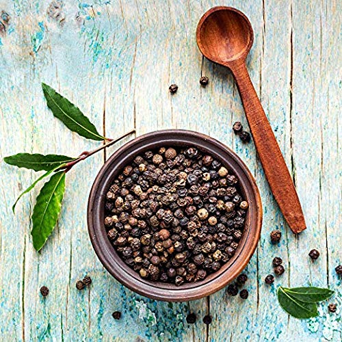 Macro texture shot of whole peppercorns from THE ORGANIC PANTRY demonstrating freshness benefit