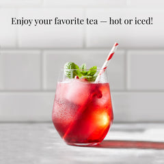 The Republic of Tea brewed cup with ruby hue illustrating vibrant fruit flavor