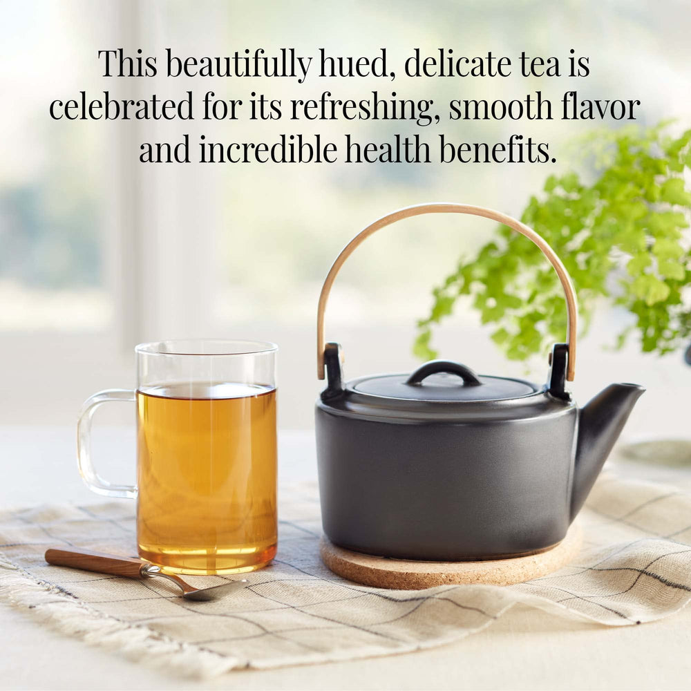The Republic of Tea cup on table with box, showing daily ritual benefit