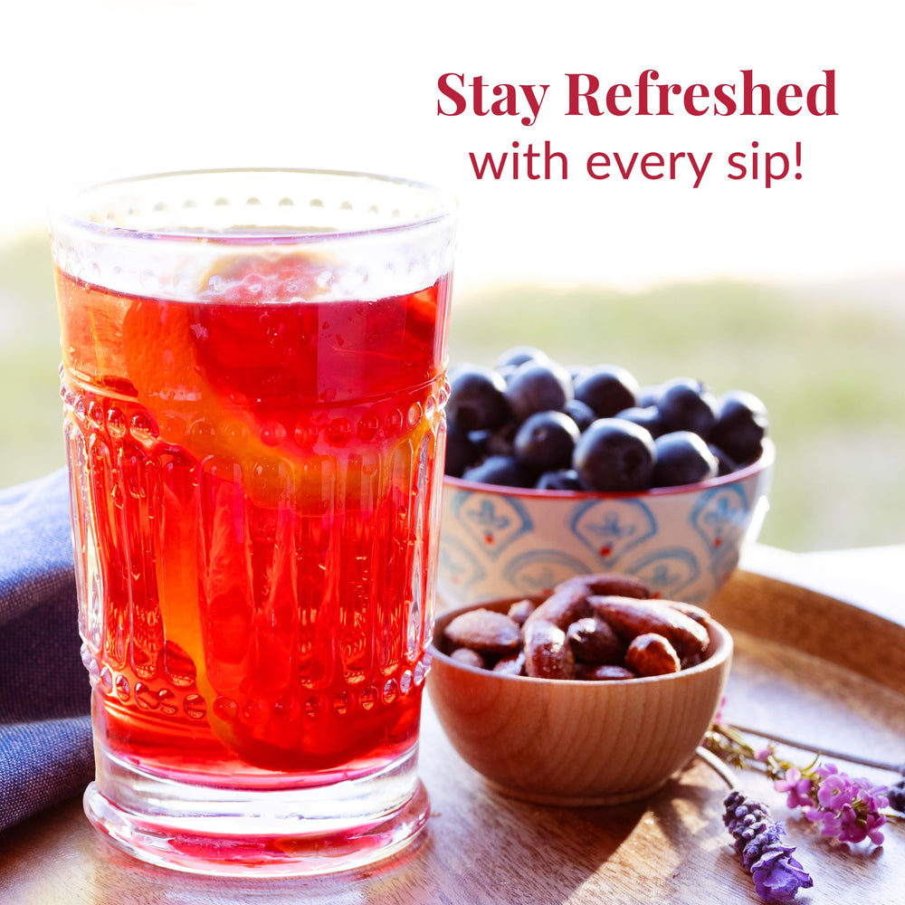 Glass of iced hibiscus coconut tea by The Republic of Tea offering refreshing cold-brew benefit