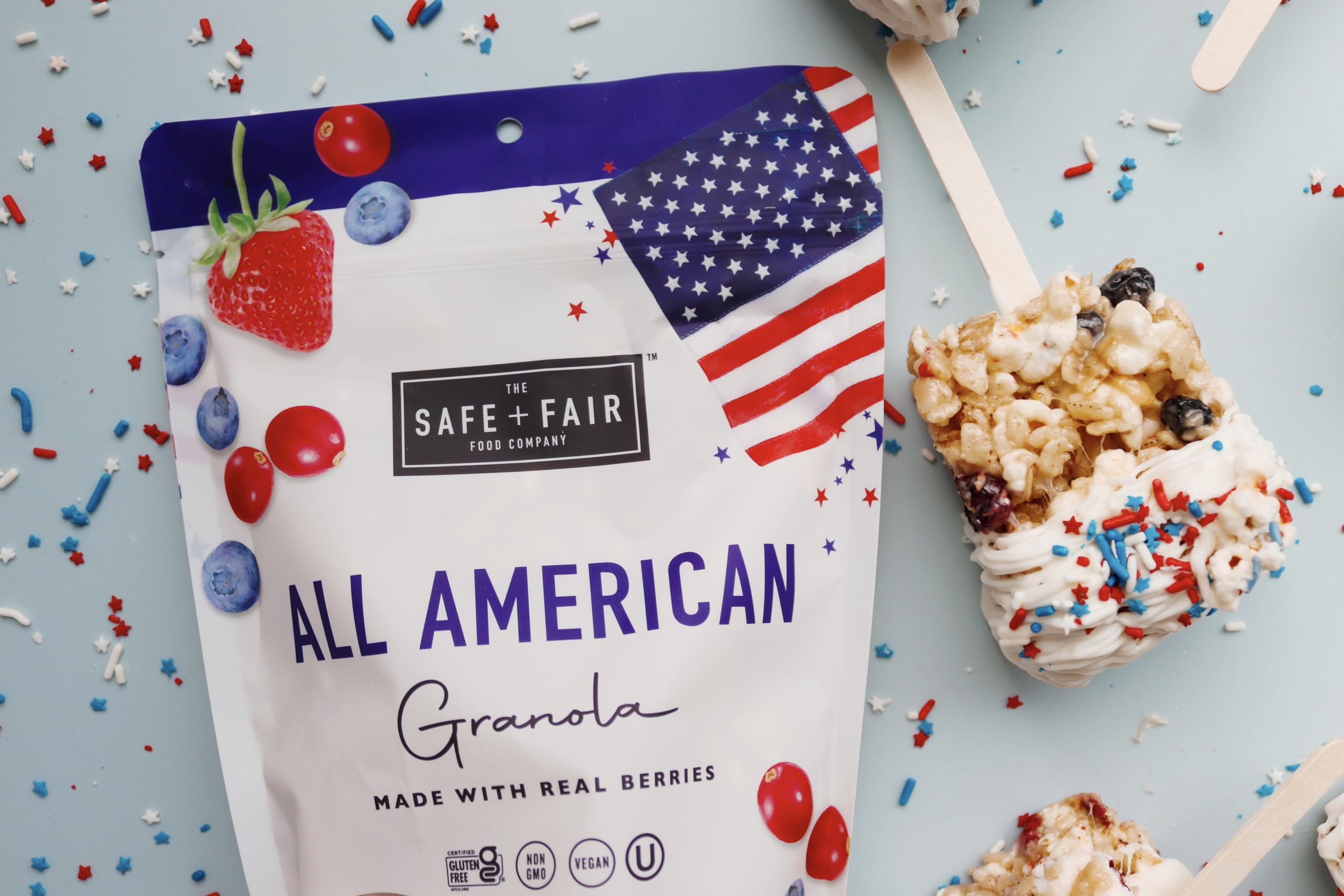 The Safe + Fair Food Company spoon scooping granola from yogurt for added protein-friendly crunch