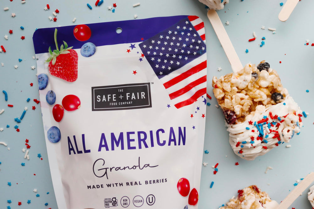 The Safe + Fair Food Company spoon scooping granola from yogurt for added protein-friendly crunch