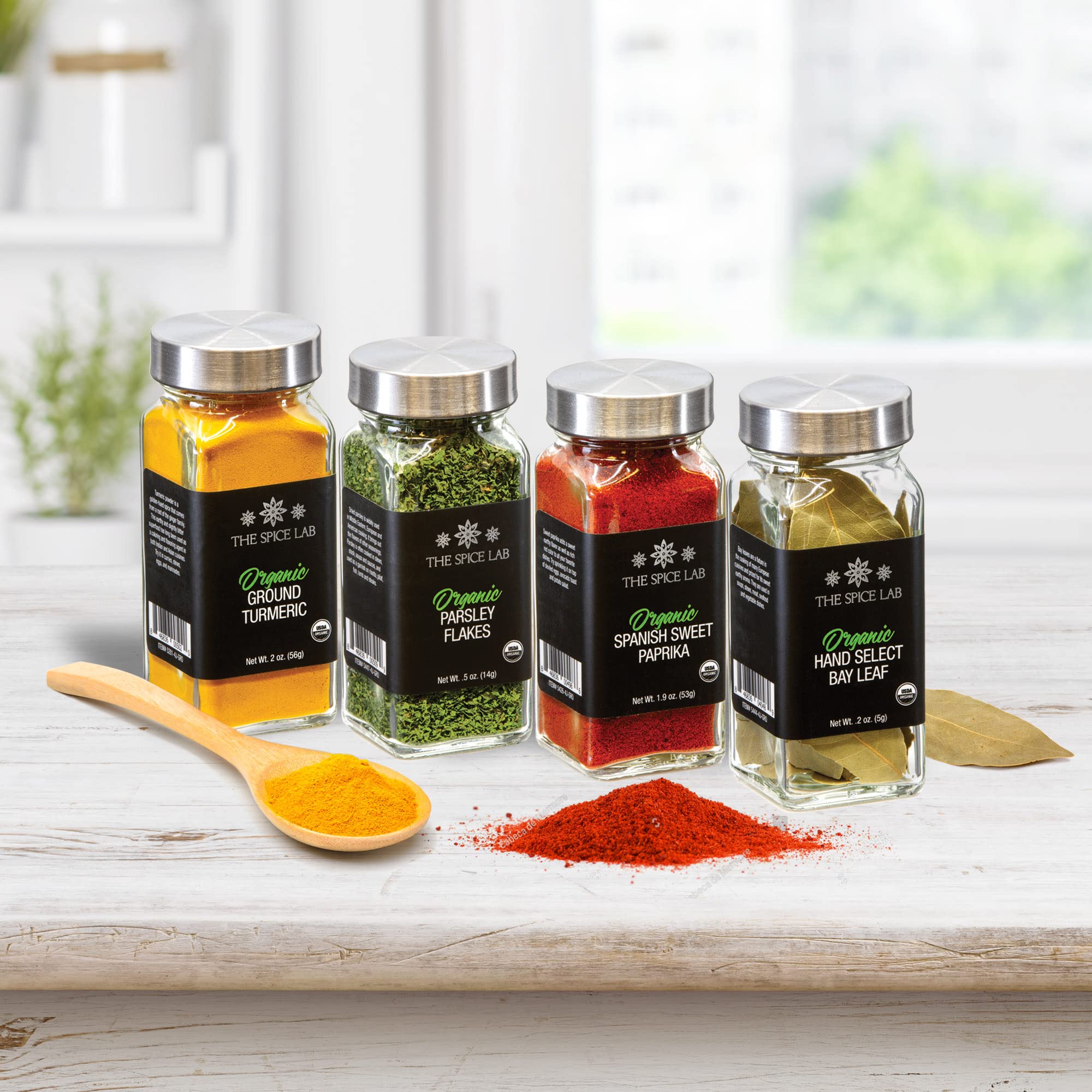 The Spice Lab jar in hand to show jar size and practical scale